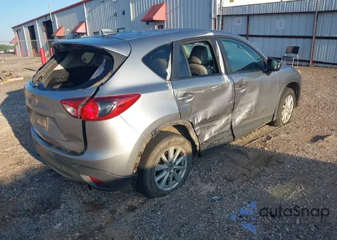 2013 Mazda Cx-5 Touring z USA, uszkodzony, nr VIN JM3KE2CE1D0103888
